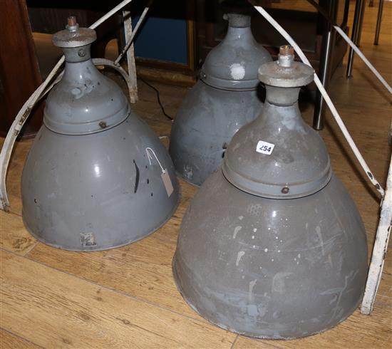 Three industrial grey enamel lamps